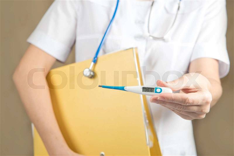 Doctor with thermometer. electronic thermometer, stock photo
