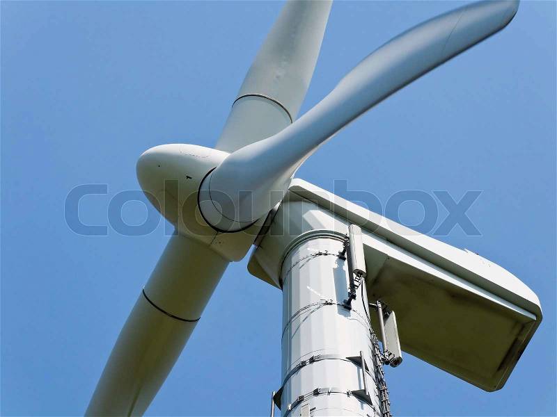 Wind energy alternative energy through wind power with blue Hmmel, stock photo