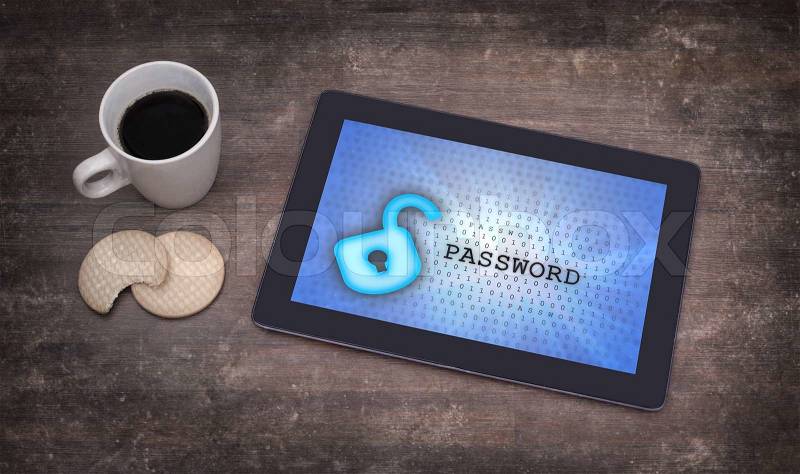 Tablet on a desk, concept of data protection, blue, stock photo