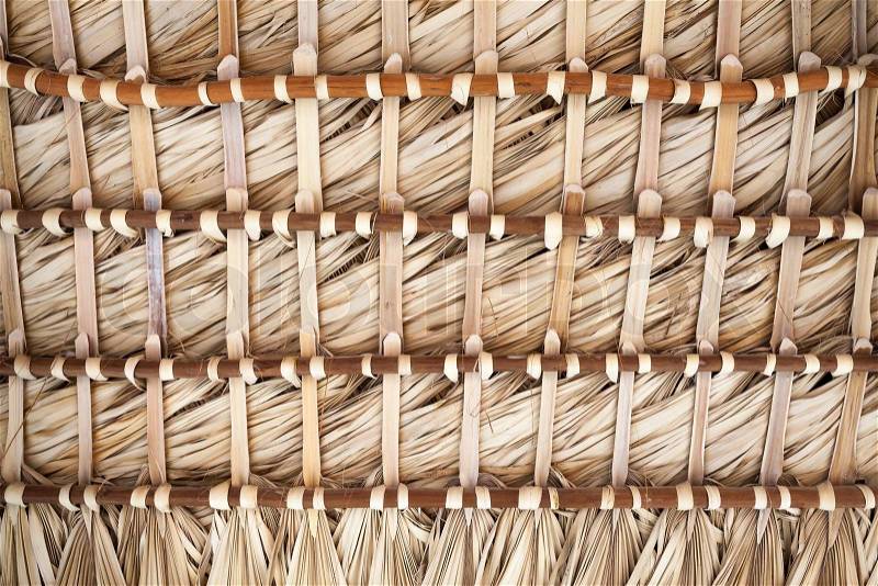 Roof made of dry palm leaves, back side background texture, stock photo