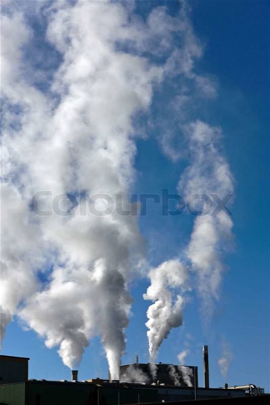 Smoking chimney of an industrial company. Pollution and waste gases, stock photo