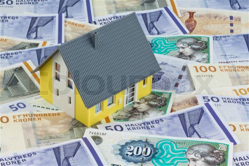 Danish crowns. Currency from Denmark in Europe. Model home. Costs for homes and houses, stock photo