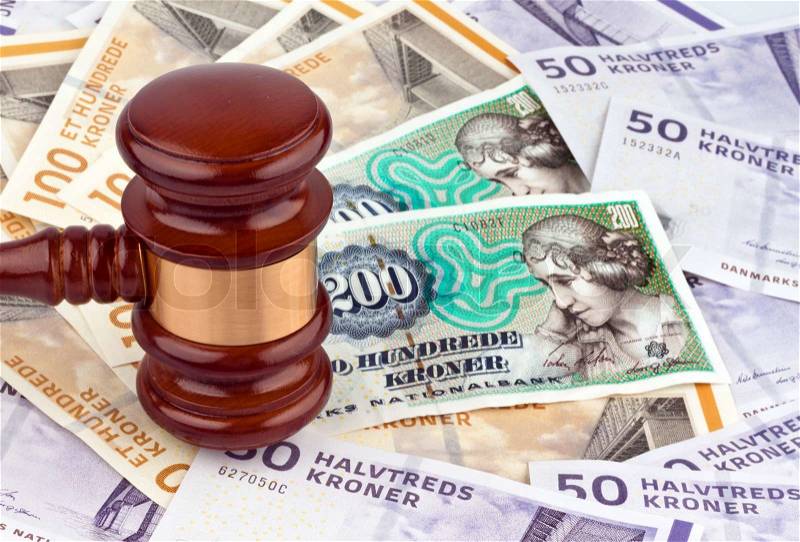 Danish crowns. Currency from Denmark in Europe. Gavel. Cost of justice, stock photo
