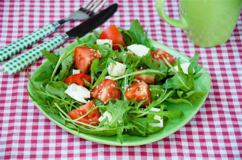 Greece salad with mozzarella, ruccola and tomatoes, stock photo