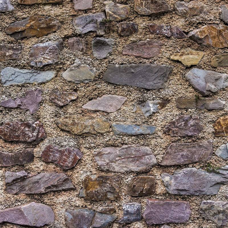 Old stone wall. pattern of decorative slate stone wall surface. Abstract background of stone wall texture, stock photo
