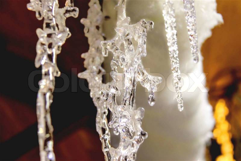 Icicle in light of the of evening sun, stock photo