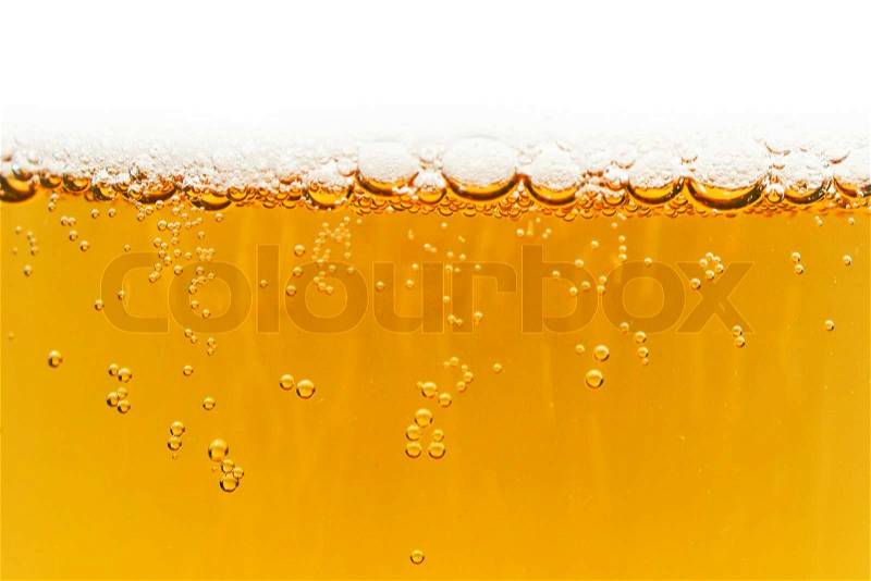 Foam bubbles mug of beer texture background, stock photo