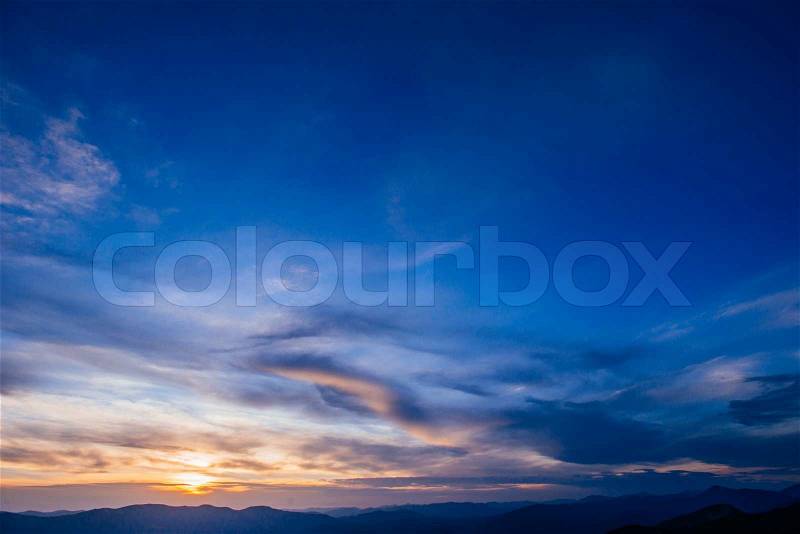 Colorful sky with sun background in mountains. sunset, sunrise, stock photo