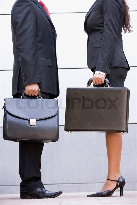Cropped image of business meeting outside modern office, stock photo