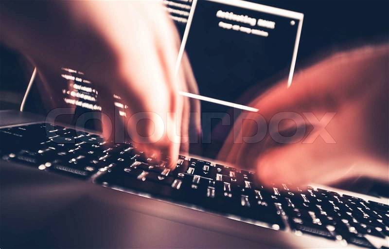 Hacker in Work. High Speed Computer Keyboard Typing by Professional Hacker. Hacking the Internet Photo Concept, stock photo