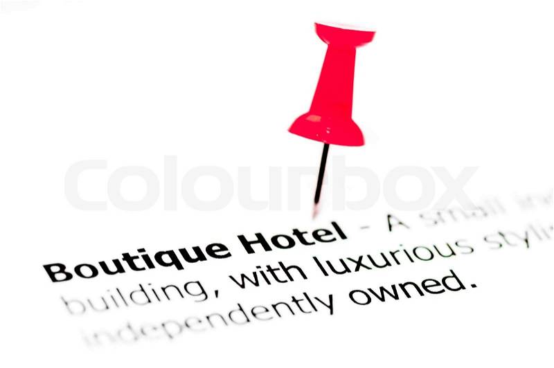 Words Boutique Hotel pinned on white paper with red pushpin, copy space available, Business Concept, stock photo