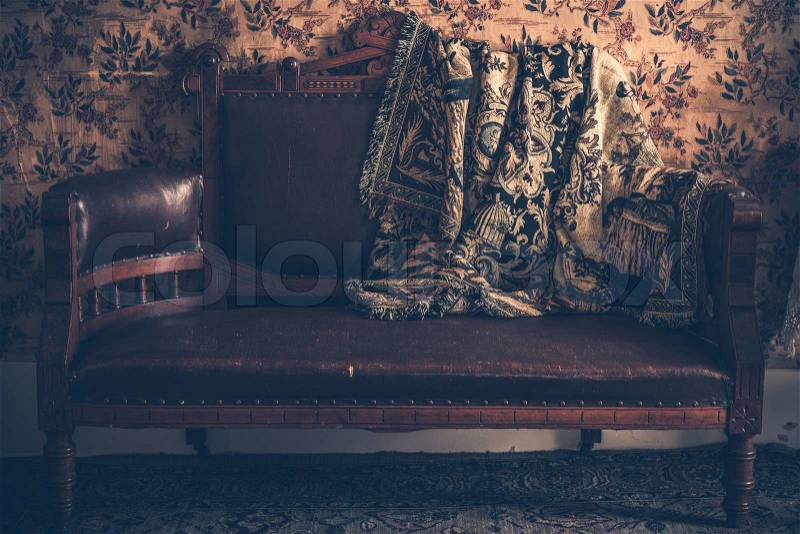 Vintage Leather Sofa with Vintage Blanket, stock photo