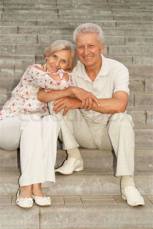 Beautiful elderly couple went for a walk around the city together, stock photo