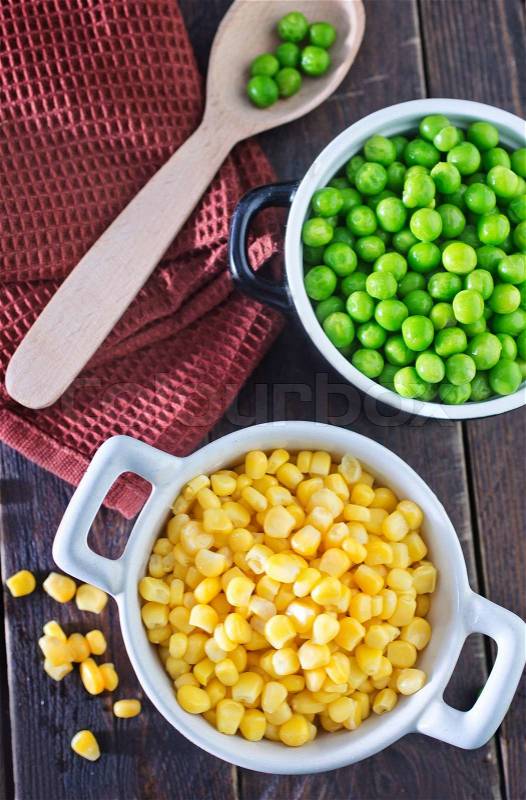 Sweet corn and green peas in bowl, stock photo