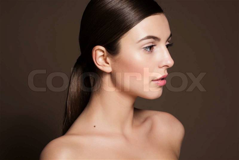 Portrait of a naturally beautiful girl with flawless perfect skin , stock photo