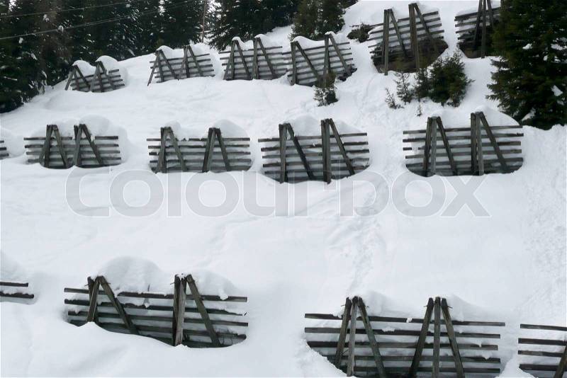 Avalanche control to protect against snow avalanches, stock photo