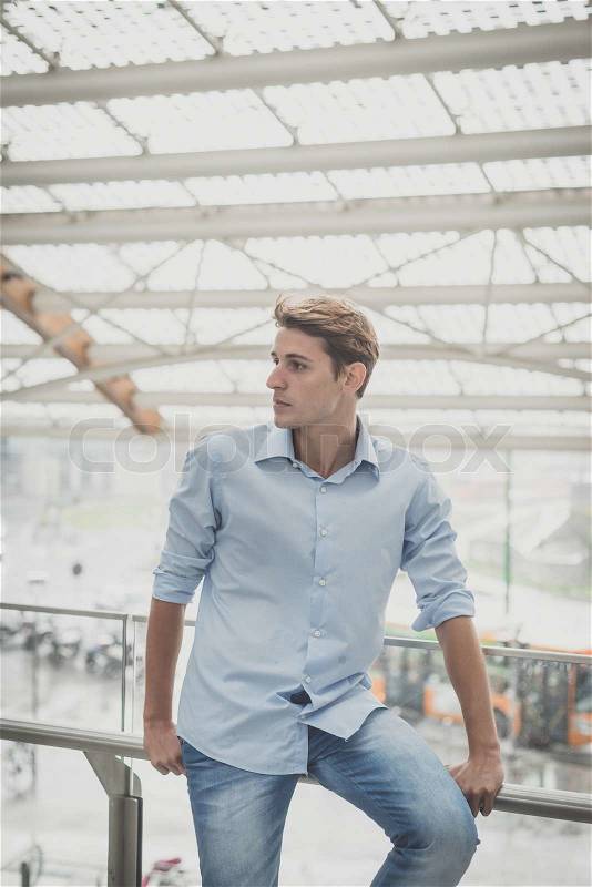 Young model hansome blonde man in the city, stock photo