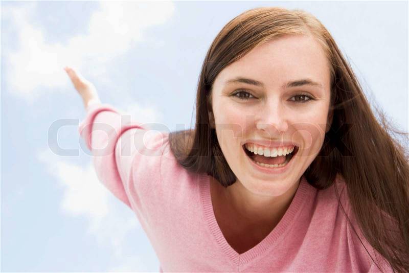 Young woman relaxed and happy outside, stock photo