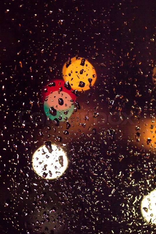 Bokeh on the glass from the rain, stock photo