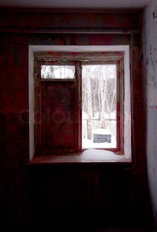 Broken window in the house, winter, stock photo