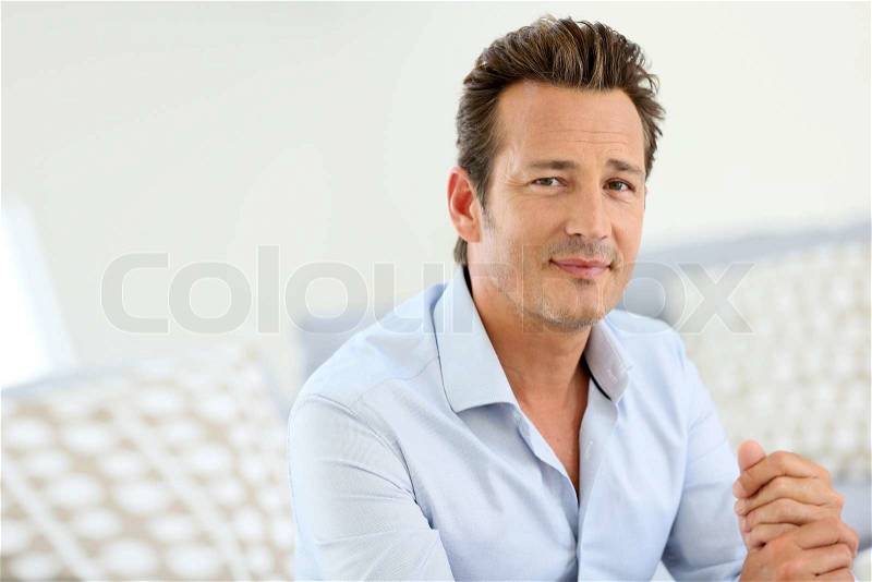 Portrait of handsome 40-year-old man, stock photo