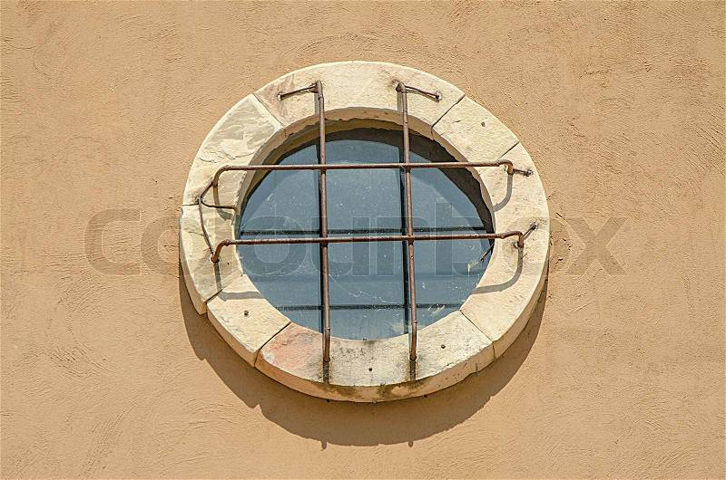 Old window circle design vintage on wall background, stock photo