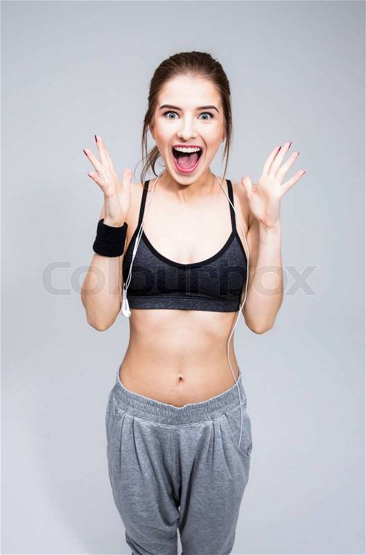 Beautiful sports woman feel surprised facial expression, stock photo