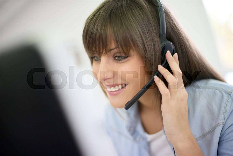Customer service representative on the phone, stock photo
