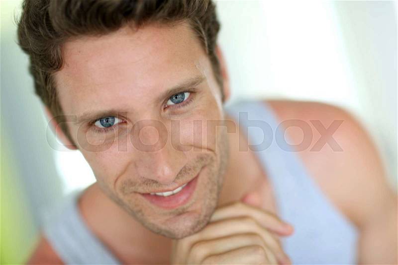 Portrait of handsome 30-year-old guy , stock photo