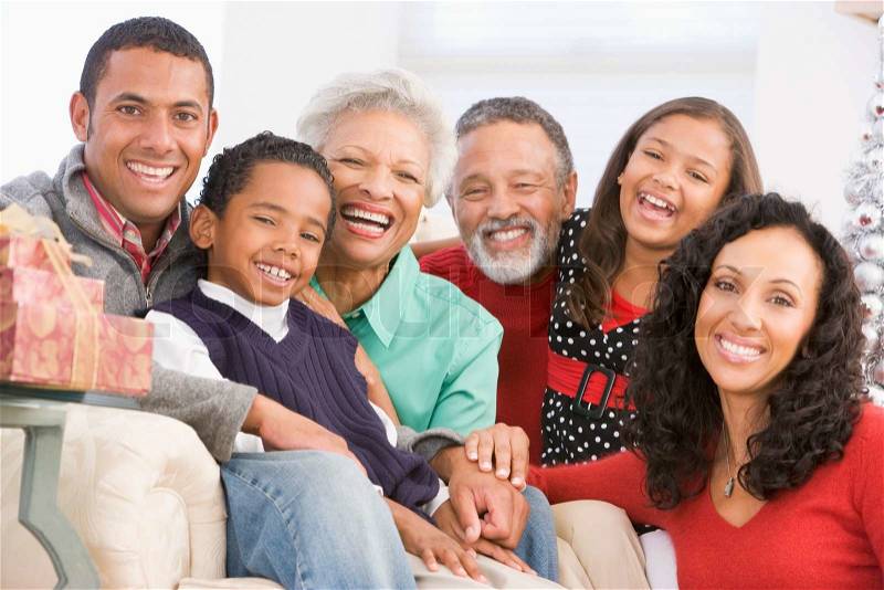 An african-american family with their grandparents celebrating Christmas day, stock photo