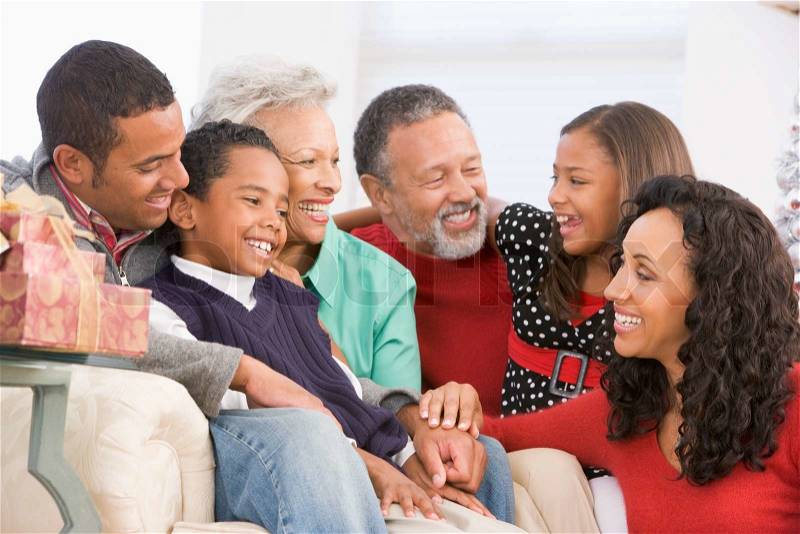 An african-american family with their grandparents celebrating Christmas day, stock photo