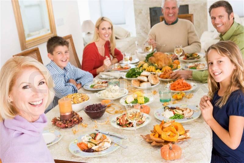 A caucasian family enjoying their thanksgiving dinner, stock photo