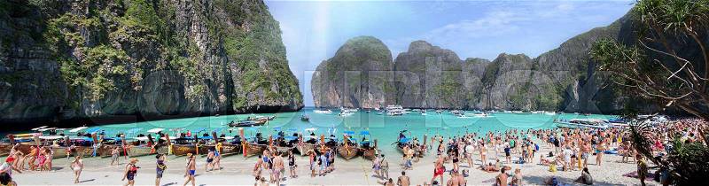 PHI PHI ISLAND,THAILAND-JANUARY 3, 2015:Tourists on the wonderful Maya beach of Phi Phi Leh island Thailand on 3 January, 2015, stock photo