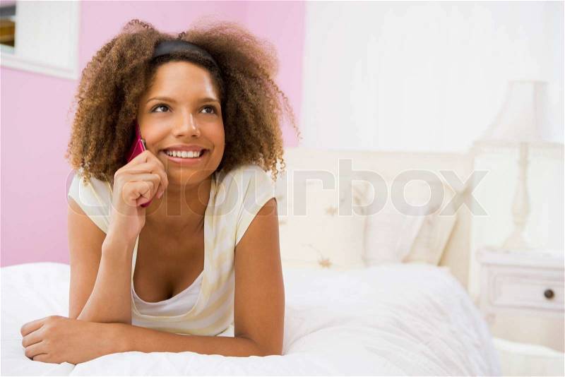 Stock image of 'looking at camera, lying down, lying on front'