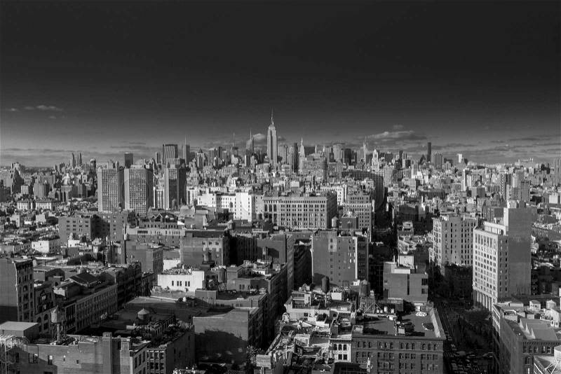 USA, NEW YORK CITY - April 27, 2012: New York City Manhattan skyline aerial view with street and skyscrapers. colorless photo , stock photo