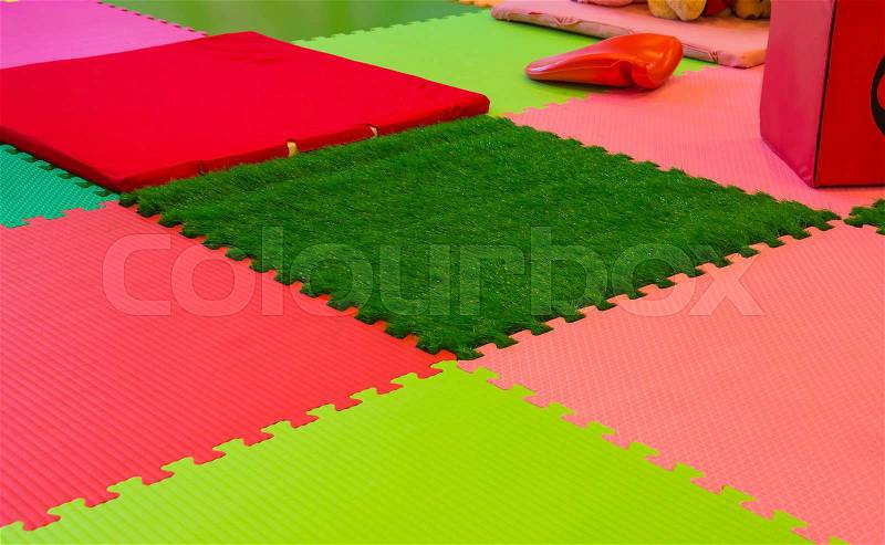 Rubber foam for baby play in playroom, stock photo