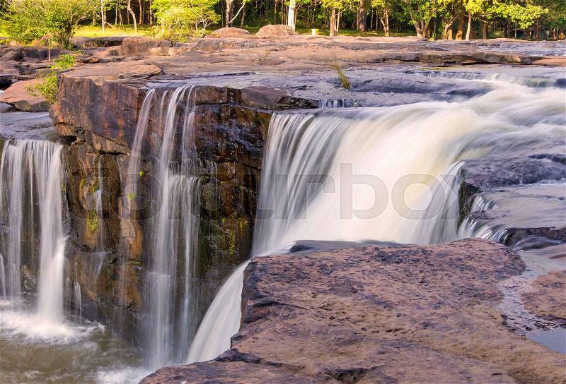 Waterfall in deep rain forest jungle. TadtonWaterfall Chaiyaphum, Thailand, stock photo
