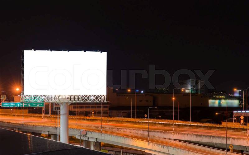 Blank billboard at night for advertisement, stock photo