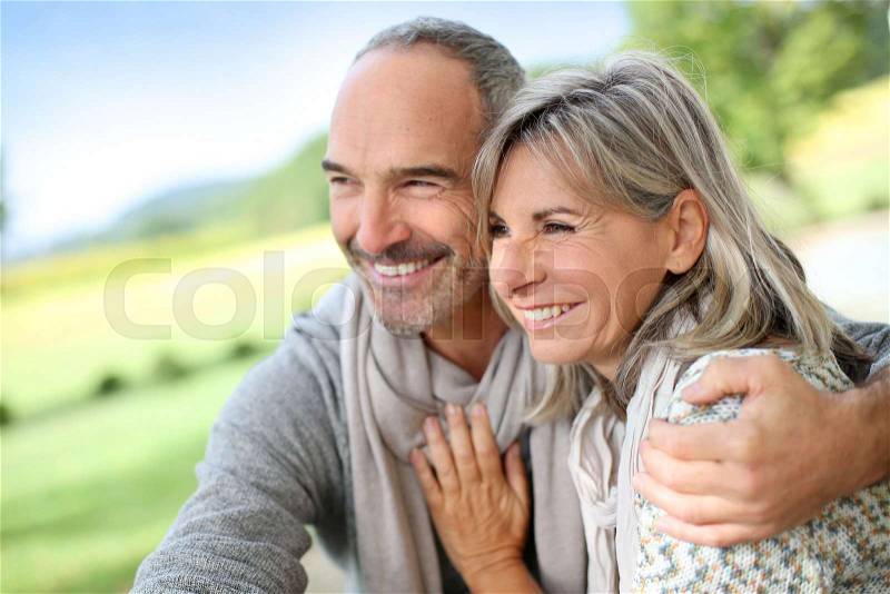 Portrait of loving senior couple, stock photo
