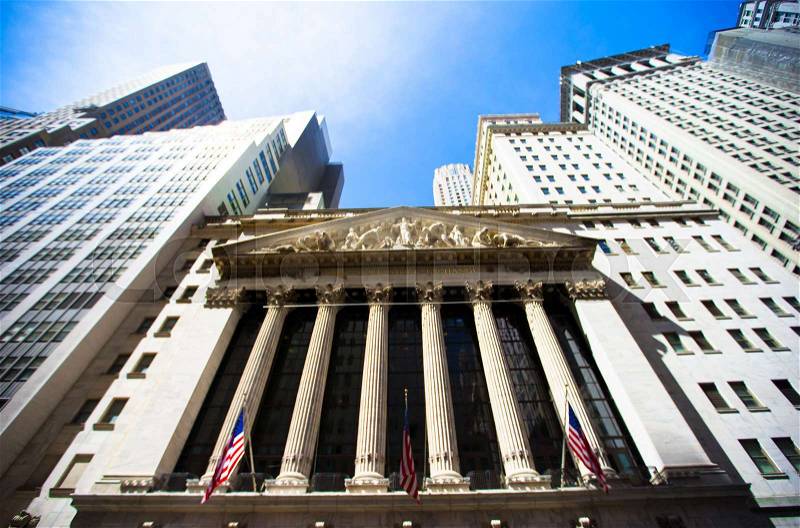Wall Street with New York Stock Exchange in Manhattan Finance district, stock photo