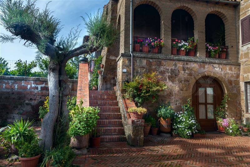 Italian patio in old village Pitigliano, Tuscany, Italy, Europe, stock photo