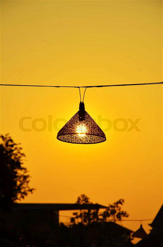 Bamboo lamp in the sunset, stock photo