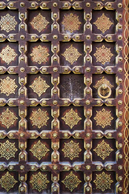 Old wooden door in City Palace, Jaipur, Rajasthan, India, stock photo