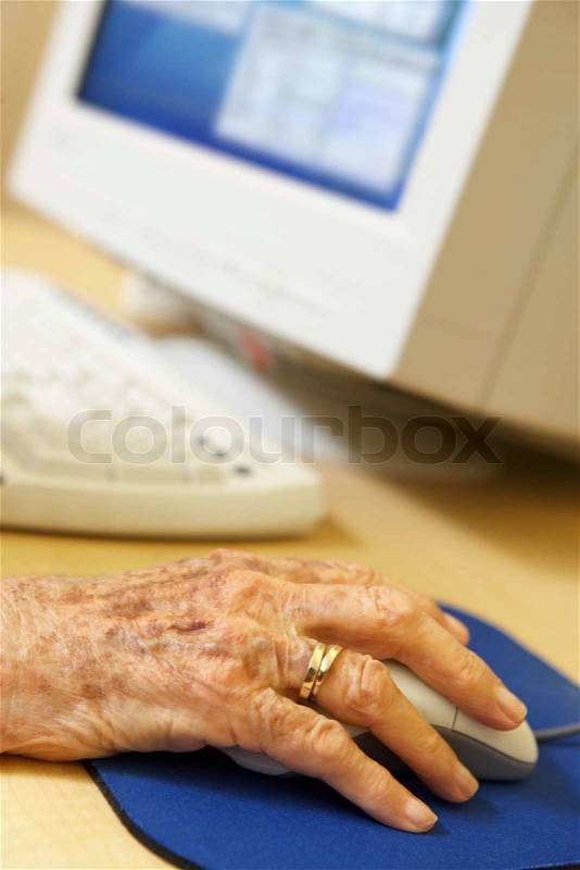 Person using computer, stock photo
