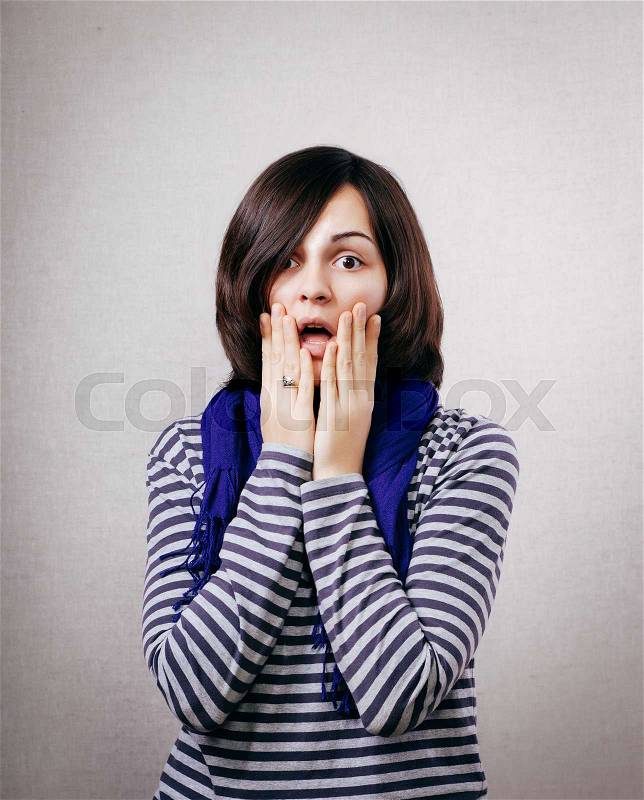 Young cool woman fear face, stock photo