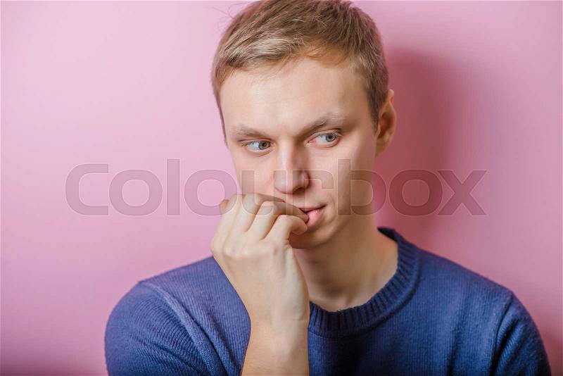 Blond young man. Gesture. does not know what to do, confusion, stock photo