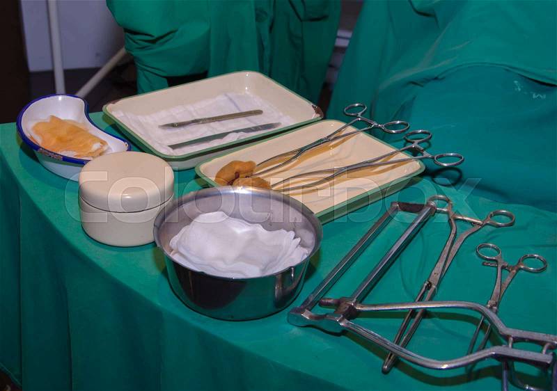 Surgeon and old surgical tools.(simulation), stock photo