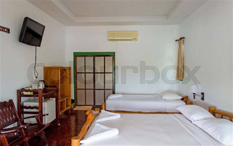 Luxury white bedroom in resort, stock photo