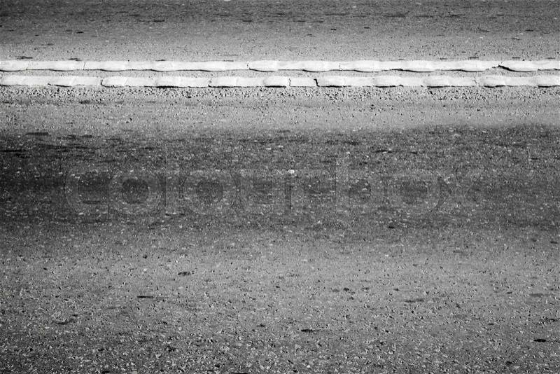 Abstract asphalt road fragment, automotive transportation background, road marking with double dividing line, stock photo