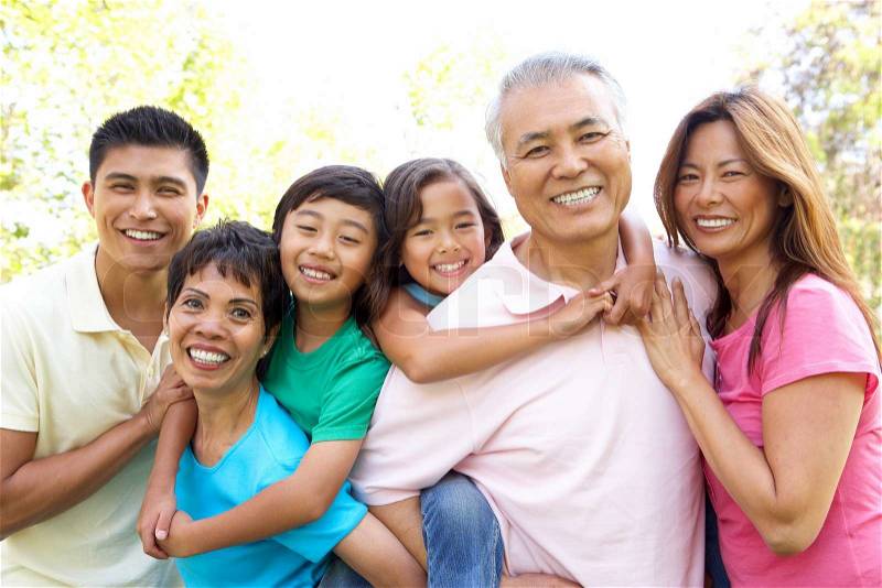 Portrait Of Extended Family Group In Park, stock photo